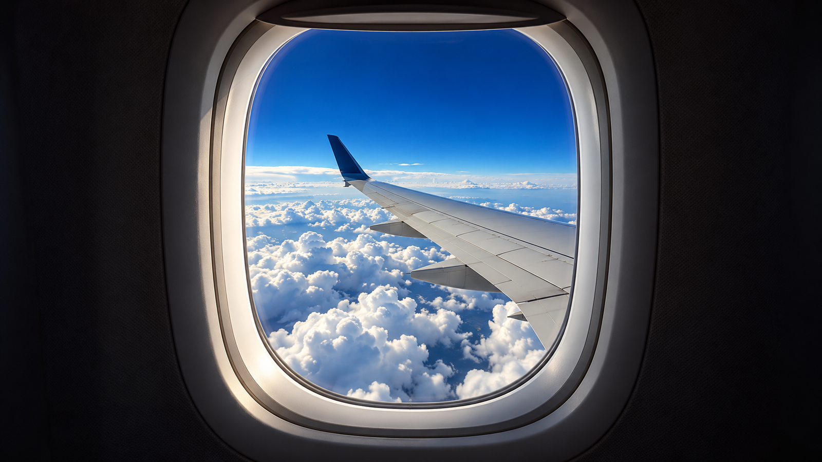 AI-generated airplane window view above the clouds, used as the first frame